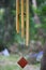 Windchimes hanging from a tree