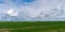 Windfarm in Dithmarschen northern Germany with green fields and blue sky