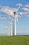 Windfarm in Dutch landscape with field of sugar beets