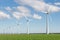 Windfarm in Dutch landscape with field of sugar beets