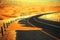 Winding black asphalt road through the sand dunes of Liwa oasis, United Arab Emirates