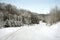 Winding Country Road Landscape in Winter Snow