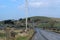 Winding countryside road and green fields