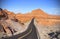 Winding desert highway, travel adventure concept.