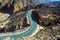 Winding desert sandstone road of Jais mountain in UAE