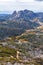 Winding dirt road and rugged cliffs at Mount Buffalo National Pa