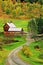Winding driveway to rural farm in Autumn color Vermont
