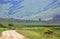 Winding Farm Road With Irrigation System In Corn Field