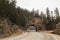 Winding highway through a rock tunnel