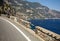 A winding and narrow road on the Amalfi Coast between Positano and Amalfi. Campania, Italy.