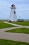 Winding path to Port Borden Back Range Light at Marine Rail Park with Northumberland Strait on the horizon