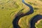 Winding river, aerial view. Summer landscape, top view. A green valley with a winding riverbed