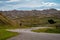 Winding road through the Badlands National Park near Yellow Mounds Overlook