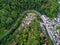 Winding road serpentine from a high pass in the rhine village Isenburg near Bendorf Sayn Germany Aerial view