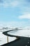 Winding road, snow, blue sky, Dettifoss, Iceland