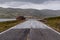 Winding road with snow levels in Norway