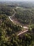 Winding roads and crossroads in the forest. Captured from above