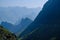 Winding roads through valleys and karst mountain scenery in the North Vietnamese region of Ha Giang / Van