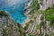 Winding stairs leading down to sea on a steep slope