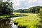 Winding stream through salt marsh