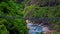 The winding valley and the beautifully textured marble mountain walls are in Yanzikou, Taroko National Scenic Area