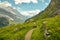 Winding walking trail high above the Oeschinensee lake