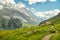 Winding walking trail high above the Oeschinensee lake