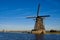 Windmill the Achtkante Molen along a canal near Groot-Ammers