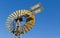 Windmill against blue sky