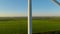 Windmill blades rotating in closeup. Wind tower creating energy in slow motion.