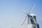 Windmill blue sky background