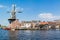 Windmill and cafe along Spaarne river, Haarlem, Netherlands
