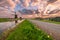 Windmill and Canal on Traditional Holland Landscape