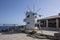 Windmill, Cape Skinari, Zakynthos - September 27, 2021: Beautiful traditional greece windmill on the rock up coastline