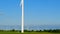 Windmill closeup on blue sky and windmills set background. renewable energy.Alternative energy sources.Environmentally