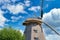 Windmill with cloudy sky