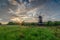 Windmill at dawn in spring