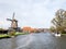 Windmill De Jager by Ee river in Woudsend in Friesland, Netherlands