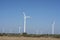 Windmill desert area with blue sky