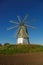 windmill dutch type against blue sky