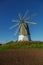 windmill dutch type against blue sky