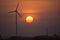 Windmill energy and the morning sunrise in city Dwarka