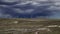 Windmill Field Drone Pan with Approaching Storm 4K