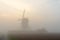 An Windmill in the fog