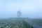 An Windmill in the fog