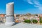 Windmill and fortress on Monte Sacro viewed from archeological park on cerro del molinete in Cartagena, Spain