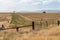 Windmill and hay bales, Northern California