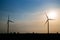 Windmill industrial farm with cloud and a blue sky, Wind turbine field