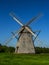 Windmill in Lithuania. Europe. Blue sky background.