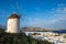 Windmill of Mykonos and skyline with blue sky, Greece